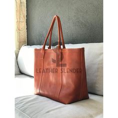 "Beautiful Oversized tan leather bag. Unlined, but it includes 3 big inside pockets. There is also the possibility to include a whole inside lining, and then we could add all the inside pockets that you need, if you are interested, please contact us. Simple and stylish. You can use it as a weekender bag, or if you need to carry a lot of stuff for your day. --------------------------------------------------------------------------------------------------- Optional: Add Zipper: The bag keeps the shape and the same aperture of the bag as if the bag had no zipper, but you can close it when necessary (you can see the bag with zipper in a couple of pictures of the black bag). Inside lining: There is also the possibility to include a whole inside lining, and then we could add all the inside pocke Travelling Bag, Leather Bag For Women, Tan Leather Bag, Luxury Tote Bags, Brown Leather Tote Bag, Sac Week End, Bag Inside, Brown Leather Totes, Leather Laptop Bag