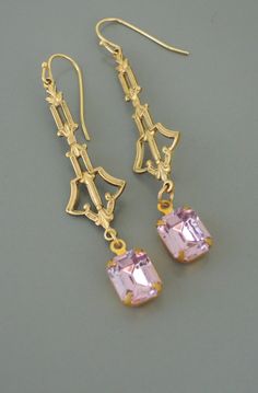 "Vintage Jewelry - Vintage Earrings - Art Deco Jewelry - Gold Wedding Earrings - Pastel Earrings - Pink Earrings - Rhinestone Earrings Gorgeous Art Deco earrings embellished with pretty pastel lilac colored rhinestones. Perfect Bridesmaid earrings for your vintage wedding. So on trend. Chloe says, Wear them and feel fabulous!\" They measure 2 1/2\" long from the top of the ear wire. Thanks for visiting Chloe's" Elegant Pink Earrings With French Hook, Art Deco Jewelry As Gift, Antique Pink Earrings For Weddings, Antique Pink Earrings For Gift, Antique Pink Earrings As Gift, Antique Pink Earrings Gift, Victorian Pink Earrings For Wedding, Pink Victorian Earrings For Gift, Victorian Style Pink Earrings For Gift