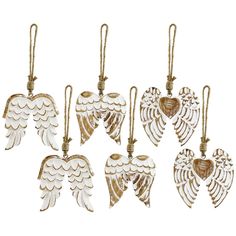 six white and gold angel wings hanging from strings on a white background, each with an ornament in the shape of a heart