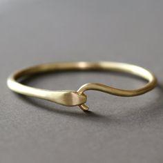 Snake bangle with rubies Everyday Brass Bracelet, Brass Bangle Bracelet For Everyday Wear, Modern Brass Bangle For Everyday Wear, Classic Brass Bangle Cuff Bracelet, Classic Brass Bangle Bracelets, Classic Round Brass Bracelets, Modern Hand Forged Bangle Jewelry, Modern Hand Forged Bangle, Modern Hinged Jewelry For Gifts