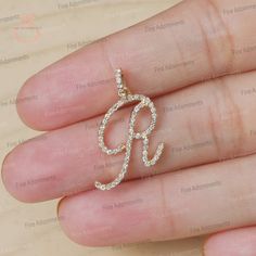 This beautiful R initial charms is made of solid 14k gold. It has used natural diamonds. diamonds has excellent cut. you can put this in your chain as necklace or you can make your bracelet. Do whatever you want, it is for cherishing. PEMJ-1559 Material : 14k Gold  Stone : Diamond  Size : 22 MM  You can contact me if you have any query about anything. Have a FINE ADORNMENT!!  ✦ This is the perfect gift for mom, wife, fiancée, girlfriend, valentine, daughter, family or friend. It is a special gif Rose Gold Diamond Jewelry With Initials, Rose Gold Diamond Charm Jewelry, R Initial, R Letter, Schmuck Gold, Alphabet Pendant, Pave Diamond Jewelry, Minimalist Painting, Gold Stone