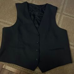 Black Vest Perfect For All Occasions. Never Worn Excellent Condition. Classic Black Vest For Business, Black Fitted Vest For Semi-formal Occasions, Black Formal Vest For Fall, Classic Black Office Vest, Black Business Vest For Fall, Black Fitted Vest For Formal Occasions, Black Fitted Formal Vest, Formal Fitted Black Vest, Fitted Elegant Black Vest