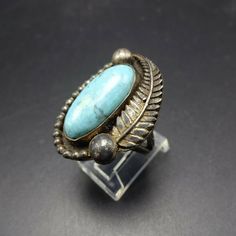 "VINTAGE NAVAJO RING DESCRIPTION: This exceptional old ring will be a treasured addition to your collection of fine vintage Native American jewelry. MEASUREMENTS: Ring face measures 1 1/4\" x 7/8\" Cabochon measures 21mm x 10mm RING SIZE: 5 3/4 WEIGHT: grams SIGNED: no STERLING: unmarked, verified sterling silver" Vintage Handmade Turquoise Ring Collectible, Vintage Adjustable Turquoise Cabochon Ring, Vintage Silver Turquoise Collectible Ring, Vintage Sterling Silver Turquoise Ring With Large Stone, Adjustable Nickel-free Vintage Turquoise Ring, Jewelry Measurements, Navajo Ring, Turquoise Men, Silver Turquoise Ring