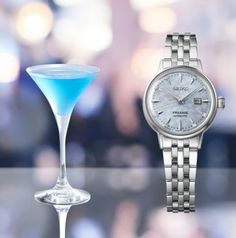 This model is inspired by the Sky Diving cocktail. The dial's light texture calls to mind the froth of a freshly made drink. One in a 3-part collection of elegant, diamond-studded timepieces. Each dial is fresh and fine, reminiscent of a specific cocktail, with a molded and wrapped finish. Several layers of a transparent coating are applied to the dial before it is polished flat for a dazzling effect. Eight diamonds on the indexes add a touch of luxurious glamour to the wrist. While retaining th Luxury Party Watches With Subdials, Luxury Watches With Subdials For Parties, Luxury Party Diamond Watch With Round Dial, Luxury Diamond Watch For Party With Round Dial, Elegant Diamond Watch For Parties, Elegant Silver Diamond Watch For Party, Elegant Silver Watch For Party, Elegant Silver Watches For Party, Elegant Silver Party Watches