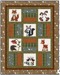 a quilted wall hanging with animals on it