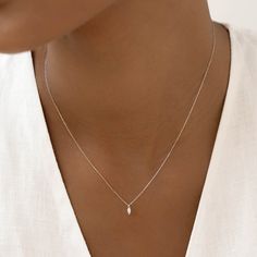 Featuring a marquise diamond drop on a dainty chain, the Aletta Necklace is an elegant and understated piece for any occasion. Crafted in 14k white gold. 


Lab grown diamond size: 2.2mm x 4.2mm

0.08 total carat weight 

Necklace can be worn at 16”, 17”, and 18” Minimalist Solitaire Necklace With Teardrop Diamond Cut Pendant, Elegant Marquise Diamond Necklace With Single Diamond, Minimalist White Gold Teardrop Pendant Diamond Necklace, Minimalist White Gold Teardrop Diamond Necklace, Classic Marquise Single Diamond Necklace, Sterling Silver Marquise Diamond Necklace, Minimalist Marquise Jewelry With Diamond Accents, Minimalist Marquise Diamond Accented Jewelry, Minimalist Jewelry With Marquise Diamond Accents