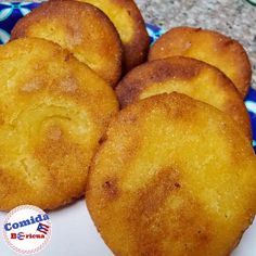 some fried food is on a white plate