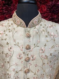 Color - Ivory Peach Traditional Cream Sets With Pearl Embroidery, Wedding Sherwani With Floral Embroidery In Traditional Drape, Wedding Sherwani With Floral Embroidery And Traditional Drape, Wedding Sherwani With Floral Embroidery, Designer Wedding Sets With Pearl Embroidery, Traditional Beige Sets With Pearl Embroidery, Beige Raw Silk Sherwani With Zari Work, Floral Embroidered Sherwani For Wedding And Festivals, Peach Embroidered Kurta For Wedding