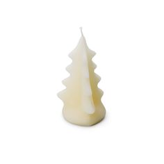 a white candle with a small pine tree on the top and bottom, sitting in front of a white background