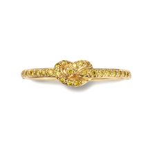 The Maiko Ring sweetly ties 14k gold, glittering yellow diamonds, and heart-felt sentiment together in an unforgettable love knot Handmade in solid 14k yellow gold 1.5mm band; 5mm knot Set halfway around with brilliant white diamond pavé Handmade to order by master jewelers in New York using conflict-free diamonds Please allow 4-6 weeks production time. For inquiries, email info@norakogan.com Luxury Yellow Gold Heart Ring With Round Cut, Luxury Yellow Gold Open Heart Ring, Yellow Heart Diamond Ring, Yellow Heart Cut Fine Jewelry, Diamond Knot Ring, 14k Gold Heart-shaped Yellow Jewelry, Unforgettable Love, Diamond Knot, Yellow Diamonds