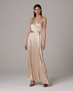 This beautiful charmeuse silk dress is a timeless statement piece. 100% silk charmeuse Model is wearing a size S and is 5'9" Product Care: Dry Clean Only Charmeuse Bridesmaid Dress, Irene Dress, Silk Wrap Dress, Bridesmaid Dress Styles, Midi Slip Dress, Silk Tank, Silk Wrap, Silk Charmeuse, Bell Sleeve Dress