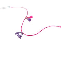 "Purchase the Calico Sun™ Cat Zoey Necklace at Michaels. com. For the kitten-loving person, this beautiful pink ball chain necklace features an enamel coated purple cat charm with delightful pink and purple tassels that bring the complementary colors of the necklace together. For the kitten-loving person, this beautiful pink ball chain necklace features an enamel coated purple cat charm with delightful pink and purple tassels that bring the complementary colors of the necklace together. Adjustab Playful Pink Jewelry With Removable Charms, Playful Pink Charm Necklaces, Playful Pink Charm Necklace For Friendship, Playful Pink Charm Necklaces For Friendship, Pink Hypoallergenic Charm Necklace For Gift, Pink Dangle Charm Necklace With Adjustable Chain, Hypoallergenic Pink Charm Necklace For Gift, Pink Pendant Charm Necklace With Lobster Clasp, Playful Purple Dangle Jewelry