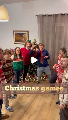 a group of people standing in front of a christmas tree with the words 3 ideas for christmas games