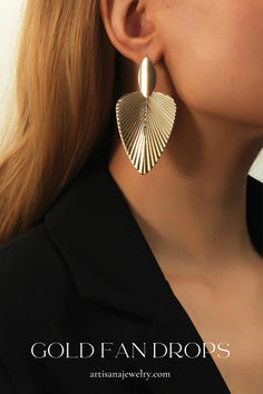 Glamorous drop earrings featuring a chic ribbed pattern with a rich yellow gold that complements any skin tone. Crafted from a lightweight alloy for comfortable wear all day long. | drop earrings | drop earrings gold | drop earrings oufit | earrings design | earrings aesthteic | statement earrings | leaf earrings gold | earrings handmade | earrings gold | womens jewelry | women accessories Gold Leaf Earrings, Stud Style, Classy Jewelry, Party Earrings, Metal Earrings, Gold Drop Earrings, Circle Earrings, Leaf Earrings, Designer Earrings