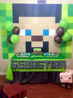 a minecraft themed birthday party with green and brown decorations, balloons and streamers