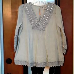 Cute Rachel Zoe Light Blue Gauzy Tunic Top With Embroidery And Lace Detail. Mirrors In The Embroidery Give It A Sparkle. New With Tags, Size Xs. Pit To Pit 20", Length About 26". Perfect For Spring! Festive Spring Top With Mirror Work, Festive Spring Tops With Mirror Work, Long Sleeve Blouse With Mirror Work For Spring, Spring Long Sleeve Tops With Mirror Work, Long Sleeve Tops With Mirror Work For Spring, Spring Silver Embellished Top, Spring Festive Blouse With Mirror Work, Spring Festive Embellished Embroidered Top, Silver Long Sleeve Summer Blouse