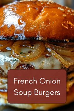 french onion soup burgers with onions and cheese on a bun in the foreground