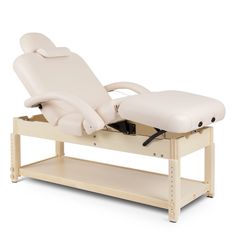 The Nirvana Adjustable Deluxe Massage Table features height adjustment, and pneumatic lift controlled back and leg rest. Constructed with European Beech wood, this super comfortable adjustable table has a 3" thick multi-layered cushion, removable arm rests and durable black vinyl upholstery. Other features include rounded corners, double leg-lock knobs, and headrest outlets on both ends. Massage Table Set Up Ideas, Portable Massage Table, Luxury Spa Massage Table, Salon Room Ideas, Wooden Massage Bed, Minerva Beauty, Esthetician Room Decor, Massage Bed, Massage Tables