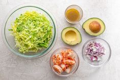 the ingredients for this salad include shrimp, lettuce, and avocado