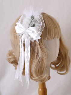 Adorn your hair with this charming feather-decorated white sweet floral bowknot hairclip. This delightful accessory features a lovely combination of white color, sweet floral design, and a decorative bowknot, making it the perfect addition to any kawaii or Lolita-inspired outfit.  Please note that this product includes only the hairclip. Cute White Headband For Spring, Elegant White Hair Accessories With Decorative Bow, White Bow For Spring Party, White Flower-shaped Hair Accessories With Matching Headband, White Bow With Matching Headband, White Floral Hair Accessories With Matching Headband, White Headband With Bow Tie, White Bow Tie Headband, White Bow Tie Hair Accessories As A Gift