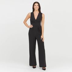 This versatile bodysuit is the ultimate solution for low-back dresses! The flawless-finish fabric is lightweight, cling-free, and offers 360 degrees of comfortable, single-layer shaping for a sleek, all-over feel. And, best of all? The innovative design features lightly padded, fit-flexible wireless cups and adjustable, convertible straps for a variety of styling options Elegant Spring Jumpsuits And Rompers With Back Opening, Elegant V-neck Elastane Bodysuit, Elegant Sleeveless Bodysuit With Built-in Bra, Fitted Jumpsuits With Back Opening, Versatile Fitted V-neck Jumpsuit, Fitted Jumpsuits And Rompers With Back Opening, Versatile Fitted V-neck Jumpsuits And Rompers, Chic Fitted Bodysuit With Back Opening, Elegant Elastane Bodysuit For Night Out