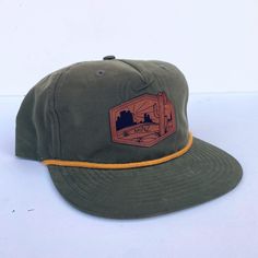 Need a new fun hat for all your day to day adventures?! We got you covered. This super comfy, lightweight five panel rope hat will be your best friend this summer. This design was created by Akinz owner and founder Suzanne Akin. Engraved faux-leather patch on an olive green 5-panel nylon hat with golden mustard yellow rope. Desert Dweller, Hat Inspiration, Fun Hat, Color Combinations For Clothes, Five Panel, Business Chic, Mens Outfit Inspiration, Hat Collection, Love Hat