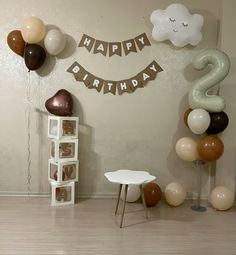 a birthday party with balloons and decorations