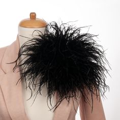 The large, black feather brooch is a stunning piece of jewelry that gives the elegance of ostrich feathers a modern edge. This stylish feather pin, made from real carmine ostrich feathers, is an excellent addition to any accessories collection. You can buy the gray version from here: https://www.etsy.com/listing/1763925655 You can buy the red version from here: https://www.etsy.com/listing/1723353871 You can buy the cream version from here: https://www.etsy.com/listing/1761919215 You can buy the Chic Black Brooches For Parties, Chic Black Party Brooches, Feather Brooch, Floral Pins, Ostrich Feather, Ostrich Feathers, Black Feathers, Dynamic Design, Accessories Collection