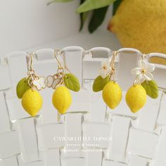 - Please read the full description below - Opaque Lemon earrings - Simple, with Butterfly or with flower * Please note, Surgical stainless steel earring hooks are Hypoallergenic. However, the rest of the parts are not. I am trying to capture the colours of the items as best as possible, however, colours may vary slightly due to lighting conditions. --------------------------------------------------------------- - Details - *Sold as pair / Quantity 1 = 1 pair of earrings - Lemon *Czech glass bead Yellow Fruit Design Earrings For Gift, Yellow Fruit Design Earrings Gift, Yellow Fruit Design Earrings As Gift, Plastic Butterfly, Lemon Earrings, Beads Flower, Earrings Butterfly, Beaded Leaf, Fruit Earrings