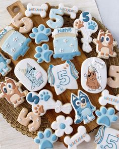 decorated cookies are arranged in the shape of animals