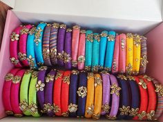 Cow Kumkum - 4 pieces per packet Jimka Kukum - 4 pieces per packet Peacock Kukum - 4 pieces per packet 2.8 sz Thread bangles - 6 piece set (2 thick bangles + 4 thin bangles) 2.6 sz Thread bangles - 2 piece set Kundan Hair clips - 5 piece set Return Gift Ideas, Housewarming Gift Ideas, Return Gifts, Thread Bangles, Return Gift, Potli Bags, German Silver, Silver Gifts, Housewarming Gift