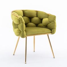 a green chair sitting on top of a wooden frame