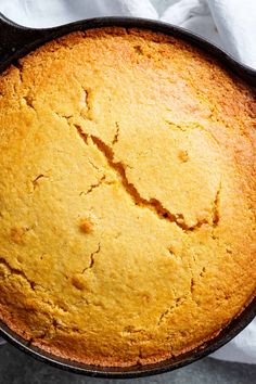 a baked cake in a cast iron skillet