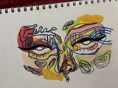 a drawing of two women's faces with different colored lines on their face and eyes