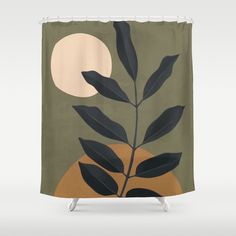 a shower curtain with leaves and the moon in the background