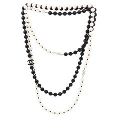 Chanel Black & White Faux Pearl Enamel Cc Logo Long Necklace Approximate Dimensions: 202 cm (Length) 1- 1.9 cm (Width) 227.5 grams in weight Chanel Black And White, Chanel Black, Cc Logo, Long Necklace, Faux Pearl, Beaded Necklace, Chanel, Jewelry Necklaces, Black White