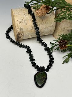 Black and bold statement is what you get with this beautiful necklace. The black seed beads are woven Kumihimo style and the Jasper pendant has a black beaded casing completely around it, with just the face of the Green Jasper face showing. The magnetic clasp makes an easy and quick on and off. Amazingly lightweight, this addition to your wardrobe makes a subtle statement showing others who you are. Black Jasper, Green Jasper, Black Seed, Jasper Pendant, Glass Bead Necklace, Beautiful Necklace, Magnetic Clasp, Damascus, Black Beads