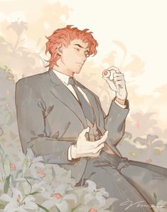 a man in a suit and tie sitting on the ground with flowers around his feet