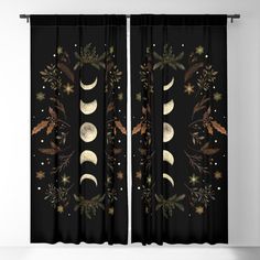 the curtains are decorated with an image of the moon, stars and leaves on black background