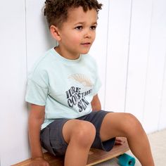 This T-shirt and shorts combo makes for the ideal ensemble to dress your little boy in on those sunny days! Crafted from cotton with a touch of stretch for added comfort, it's an outfit that he'll be happy to wear all day. Whether you're planning play dates or tackling errands, this toddler boy outfit is the perfect blend of style and comfort for any adventure. Its soft texture and charming pattern ensure he looks adorable and feels fantastic. Plus, it comes with extra pockets, ideal for him to stash away his most treasured finds. Our essentials have been independently certified with STANDARD 100 by OEKO-TEX® so that you don’t have to worry about harmful substances in your toddler's wardrobe. Includes shirt and shorts set. | Gerber 2-Piece Toddler Boys Sun T-Shirt & Cargo Shorts Set - 2T Playful Cotton Tops For Summer Adventures, Casual Graphic Print Shorts For Playwear, Green T-shirt For Playwear In Summer, Casual Green T-shirt For Summer, Sporty T-shirt For Summer Playtime, Green T-shirt For Summer Playwear, Toddler Boy Summer Fashion, Toddler Boy Beach Outfit, Dinosaur Boys Shirt