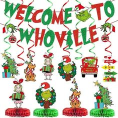 the grinch christmas decorations are hanging from red streamers that say welcome to whoville