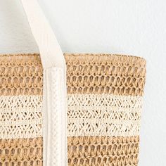 In Stock! Fast Shipping from Los Angeles! Soar to new fashion heights with Elena's Handbags Straw Woven Beach Tote! Large enough to accommodate all your essentials - and some - this bold and beautiful tote is perfect for beach days, poolside lounging, and making a strong style statement. Take a risk and go for the wow! Size: 35cm wide x 30cm tall (14in x 12in) Zipper Closure Designer Style ID: 8360 Large Straw Woven Tote Bag, Summer Bag, Everyday Shoulder Bag, Beach Bag Summer Bucket Bag For Daily Use, Beachy Tote Bucket Bag For Beach, Summer Shoulder Bag In Sand For Everyday Use, Summer Beach Tote Bucket Bag, Lightweight Beachy Straw Travel Bag, Lightweight Beachy Straw Bag For Travel, Summer Bucket Bag Tote For Vacation, Summer Style Bucket Tote Bag For Vacation, Summer Bucket Bag For Beach Vacation