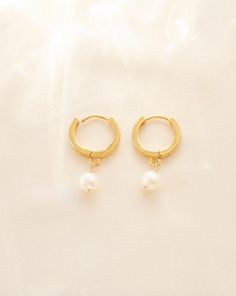 14k Gold Filled Hoop Earrings, Gold Pearl Hoop Earrings, Bridesmaid Gift, Small Pearl Hoops, Gift For Wife, Gold Tiny Hoops, Mini Hoops2 favorites blended together, huggies and pearls! Versatile for a night out or a cozy night in. These pearl huggies are definitely on-trend. -- made to order -- Details: Gold fill or sterling silver. Freshwater pearl measuring 6mm. Handmade to order in our Santa Rosa Studio. Please allow for natural variations to occur. 14k Gold Filled Hoop Pearl Earrings, Gift Pearl Charm Huggie Hoop Earrings, Gift Hoop Huggie Earrings With Pearl Charm, White Hoop Huggie Earrings Gift, White Diamond Huggie Earrings For Wedding, Small Hoop Earrings With Pearl Charm For Gift, Small Hoop Earrings With Pearl Charm As Gift, Small Hoop Hypoallergenic Earrings For Wedding, Gift Small Hoop Earrings With Pearl Charm