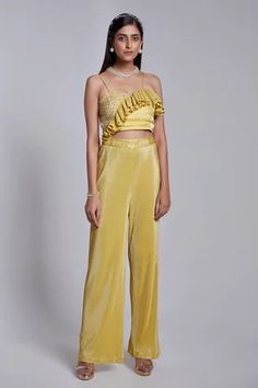 Shop for Rajkumari and Suresh Yellow Crepe Asymmetric Pattern Crop Top And Pant for Women Online at Aza Fashions Chic Fitted Festive Set, Chic Festive Fitted Sets, Fitted Ruffled Pants For Evening, Chic Festive Sets With Straight Pants, Fitted Evening Pants With Ruffles, Festive Chic Fitted Sets, Fitted Pants With Ruffles For Evening, Chic Party Sets With Ruffles, Chic Evening Sets With Ruffles