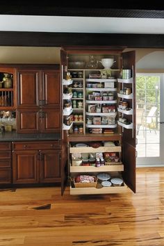 an open pantry with lots of food in it