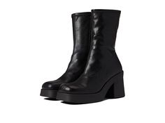 Steve Madden Klayton Boot - Women's Shoes : Black : Dress up like a fashionista wearing the Steve Madden Klayton Boots, perfect for everyday wear. Stretchable synthetic upper. Synthetic and textile lining and insole. Zippered side closure. Mid-calf shaft height. Square toe and block heel. Synthetic outsole with high traction and durability. Imported. Measurements: Heel Height: 3 1 2 in Weight: 1 lb 4 oz Shaft: 9 in Platform Height: 1 in Product measurements were taken using size 8.5, width M. Pl Fall High Ankle Platform Boots With Reinforced Heel, Fall High Ankle Platform Boots Medium Width, Casual Square Toe Moto Boots For Fall, Winter Moto Boots With Stacked Heel And Medium Width, Faux Leather Wide Calf Platform Boots, Casual Moto Boots With Square Toe For Fall, Wide Calf Platform Mid-calf Boots For Winter, Ankle-high Synthetic Moto Boots For Fall, Synthetic Ankle-high Moto Boots For Fall