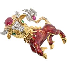 Explore the dimensions of design, where meticulous craftsmanship meets modern luxury in the exquisite David Webb Platinum & 18K Yellow Gold Red Enamel Bull Brooch. This timeless piece is a testament to elegance and sophistication, featuring cabochon and pear-cut rubies totaling approximately 3.0 carats that infuse a rich, vibrant allure into the brooch. Complementing this are pear-cut emeralds weighing around 0.25 carats, adding a delightful pop of color and a touch of refined elegance.The brilliance of this brooch is further enhanced by brilliant-cut and 8x8-cut diamonds, totaling approximately 1.20 carats, which create a mesmerizing sparkle, catching the light with every movement. Its dimensions, approximately 6.0 x 5.7 cm, make it a statement piece that commands attention and elevates a Luxury Yellow Gold Cabochon Brooches, Luxury Cabochon Brooches For Anniversary, Luxury Anniversary Brooches With Cabochon, Luxury Gold Brooches With Cabochon, Luxury Red Brooches For Formal Occasions, Luxury Yellow Gold Gemstone Brooch, Luxury Yellow Gold Brooches With Gemstones, Luxury Yellow Gold Gemstone Brooches, Luxury Evening Gemstone Brooches