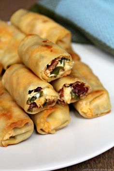 some food is on a white plate with a blue towel in the backgroud