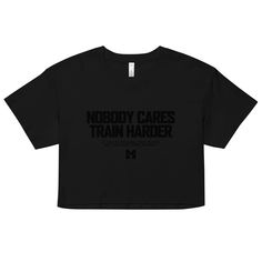 "Train Harder" Crop Top by Motiversity.Showcase your dedication and style with our "Nobody Cares, Train Harder" crop top. Perfect for the gym or a casual day out, this top will keep you motivated and looking fabulous. Order yours today and wear your determination with pride!This crop top is made of 100% combed cotton, which makes the shirt extremely soft and more durable than regular cotton shirts. The relaxed fit and dropped shoulders ensure comfortable wear, while the cropped length makes it p Sports Letter Print Crop Top T-shirt, Trendy Sports Crop Top, Cotton Graphic Print Crop Top For Sports, Trendy Cotton Gym Crop Top, Trendy Cotton Crop Top For Gym, Cotton Athleisure Crop Top For Gym, Workout Cotton Crop Top With Letter Print, Sporty Logo Print Crop Top For Streetwear, Sporty Crop Top With Graphic Print For Sports