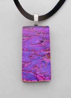 "Awesome  necklace of dichroic glass . The size is 1 1/4\" by 5/8\" and it has 18\"  black satin chain. All my jewelry come in a nice gift box." Iridescent Glass Necklaces As Gifts, Iridescent Glass Jewelry As Gift, Iridescent Glass Jewelry Gift, Iridescent Glass Jewelry For Gifts, Iridescent Large Pendant Jewelry Gift, Purple Rectangular Pendant Necklace For Gift, Glass Necklaces With Rectangular Pendant For Gift, Glass Necklace With Rectangular Pendant For Gift, Rectangular Glass Jewelry For Gifts